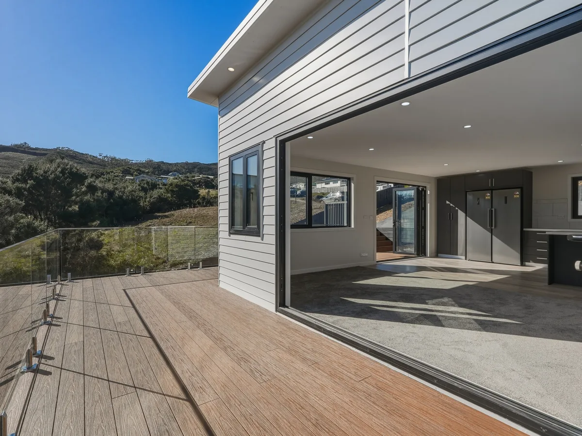 Deck and open-plan living at 7 Whitney Lane, Karikari Peninsula
