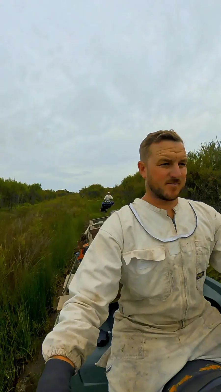 Kai Ora Honey beekeeper on a Far North mānuka apiary site